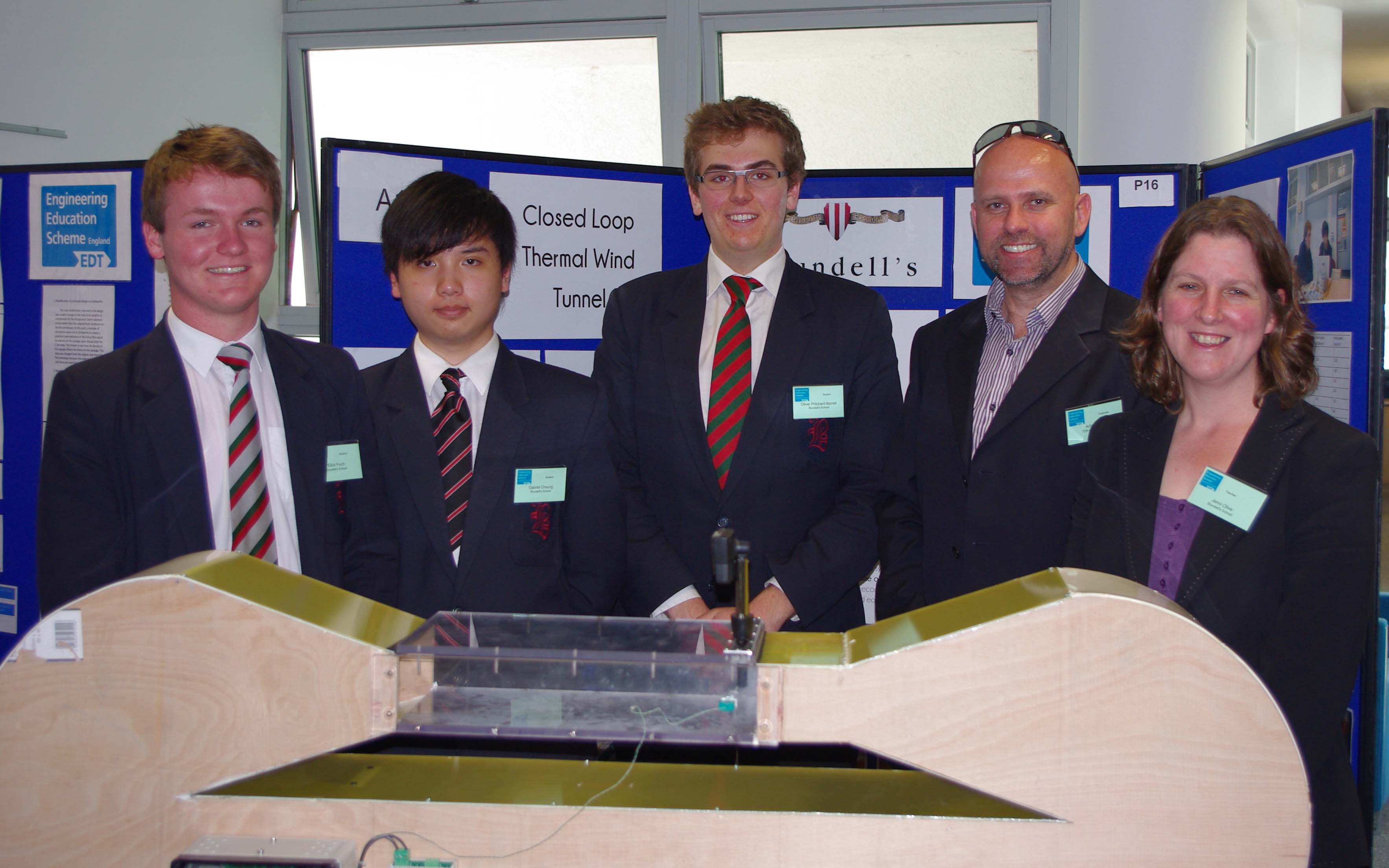 Pictured left to right: Winning project team Elliot Finch, Gabriel Cheung and Oliver Pritchard Barrett, with Adrian Irwin, Product Performance Manager, TDK-Lambda UK and Jenni Olive, Teacher Co-ordinator, Blundell's EES Team